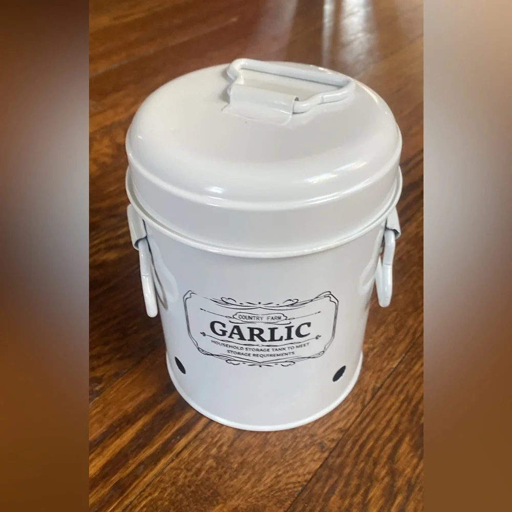 Metal garlic container